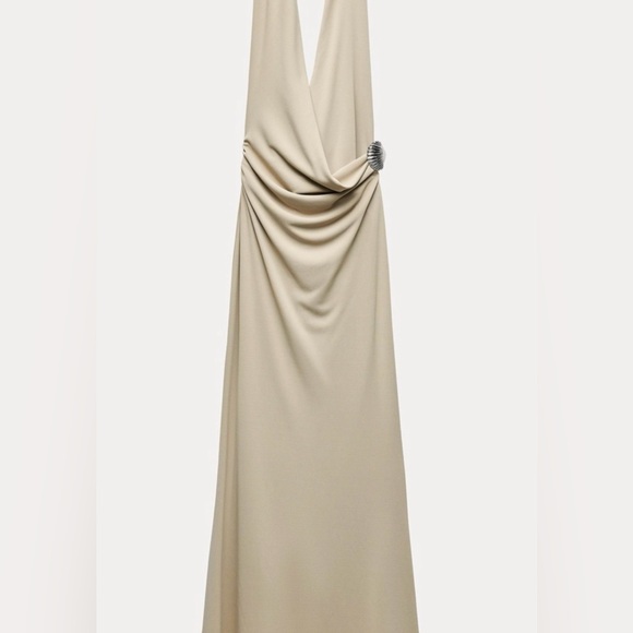 Zara beige Halter neck woman’s dress
Shell-shaped metal appliqué size medium - Picture 11 of 12